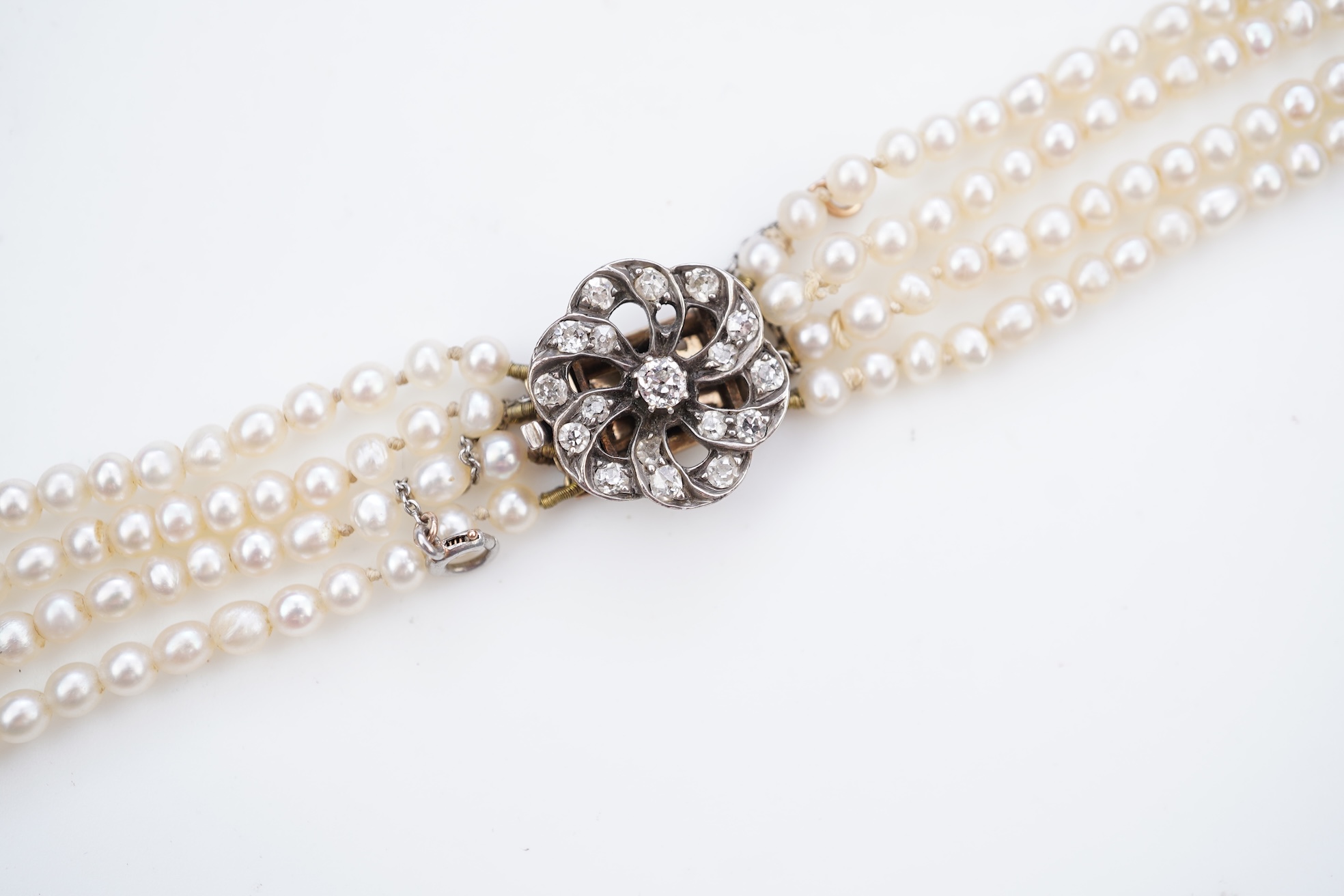 A pearl and diamond necklace, 19th century and later